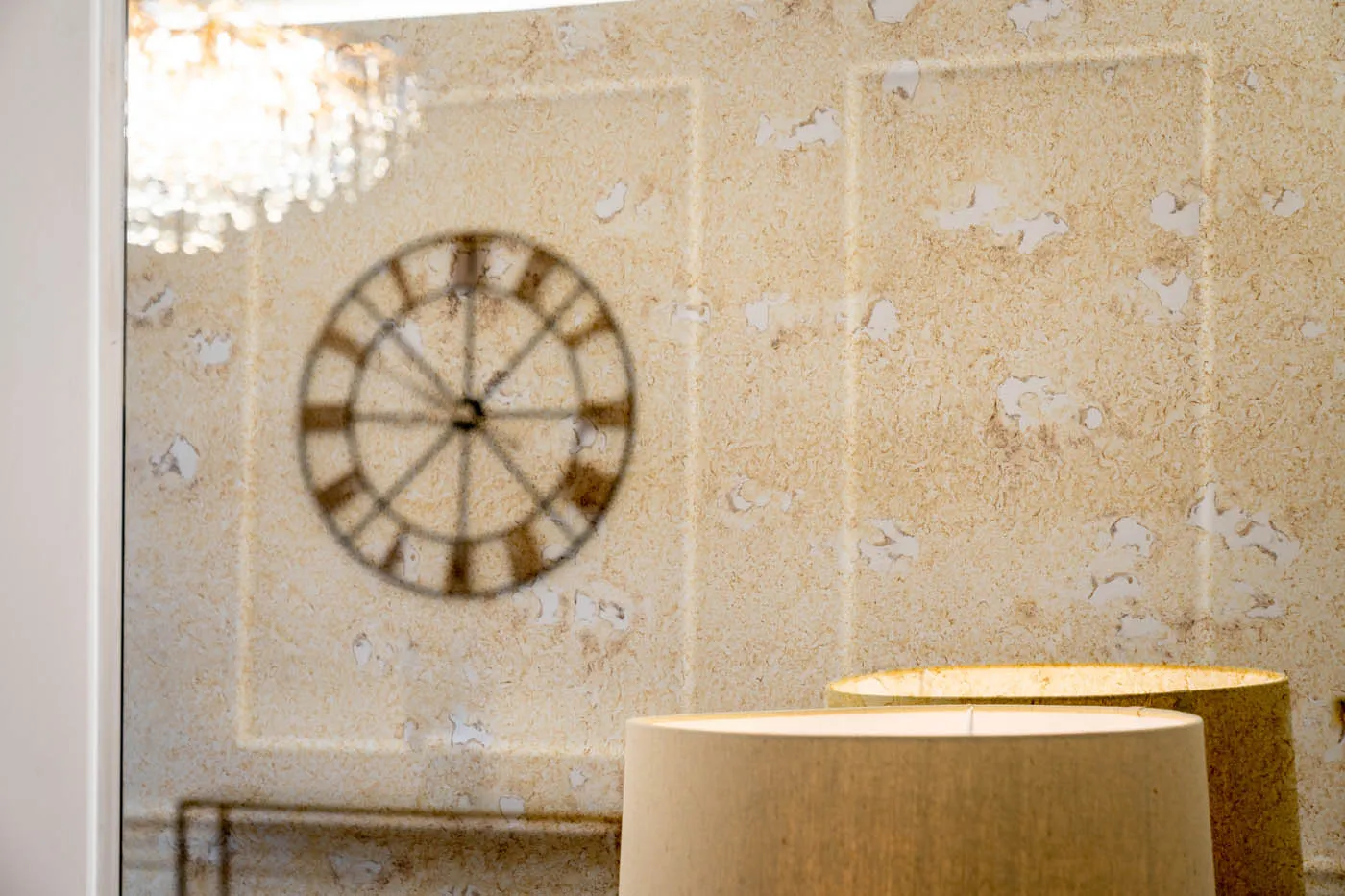 Feature wall clock against blossom wallpaper at The Row, Edinburgh
