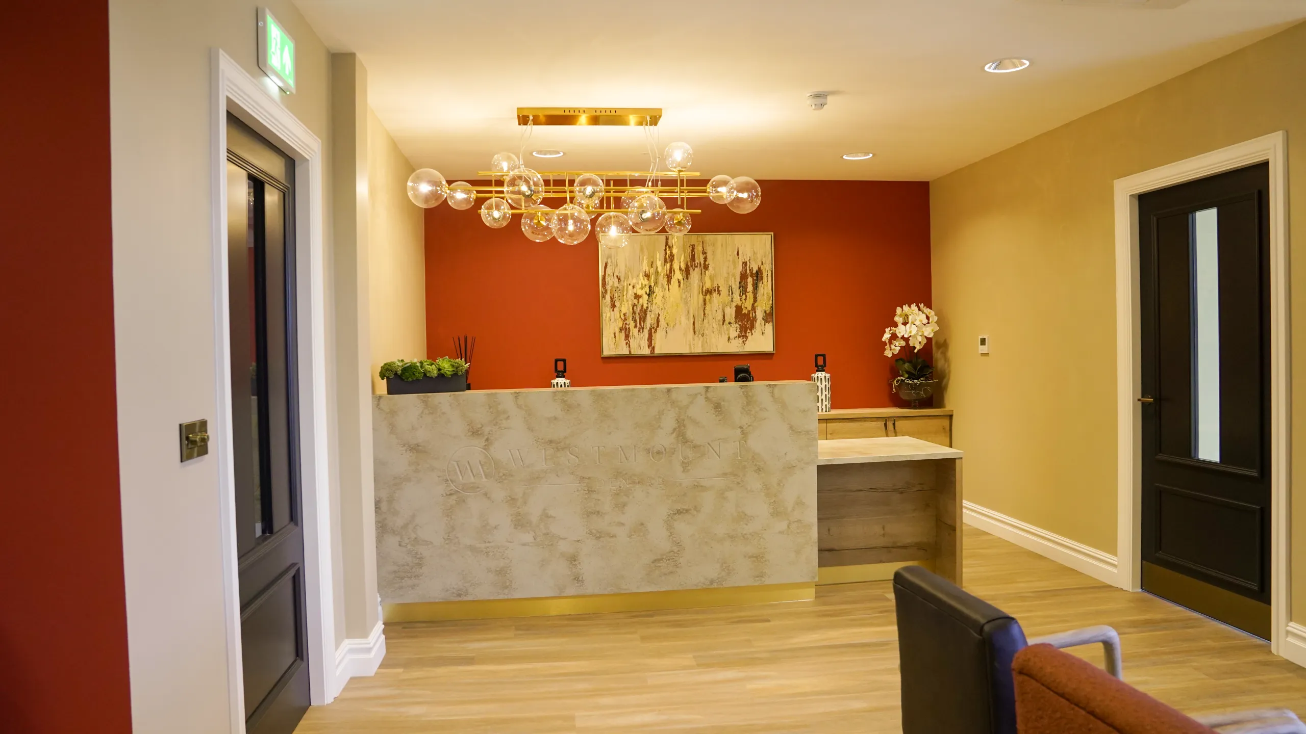 Marble-fronted reception desk from a Westmount Dental practice fit-out