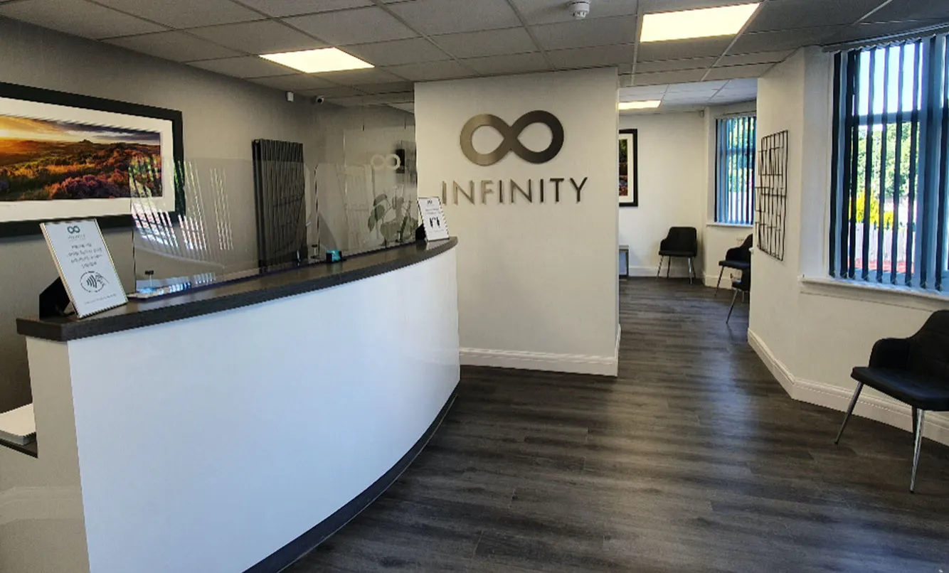 Curved reception desk at Infinity Dental Clinic, Leeds