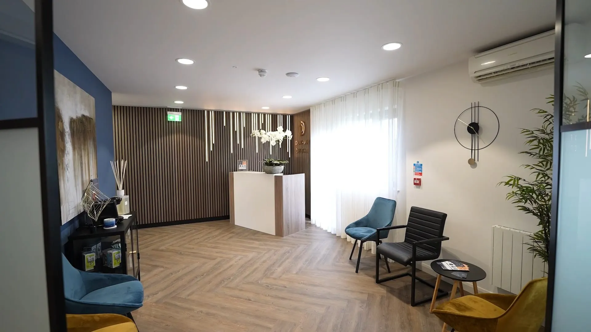 Patient waiting area with feature lighting at Durham Dental Implant Suite