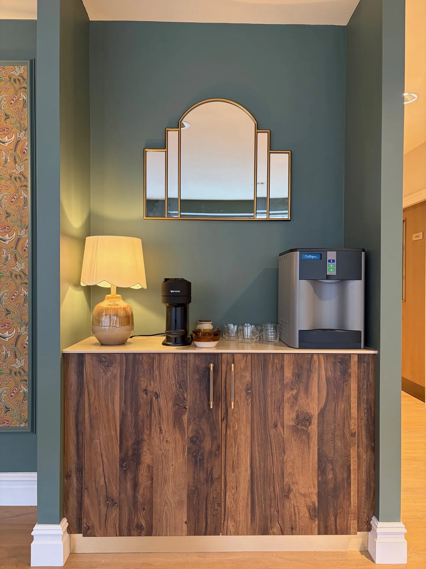 Patient refreshment station with water dispenser at Roots Dental, Morpeth