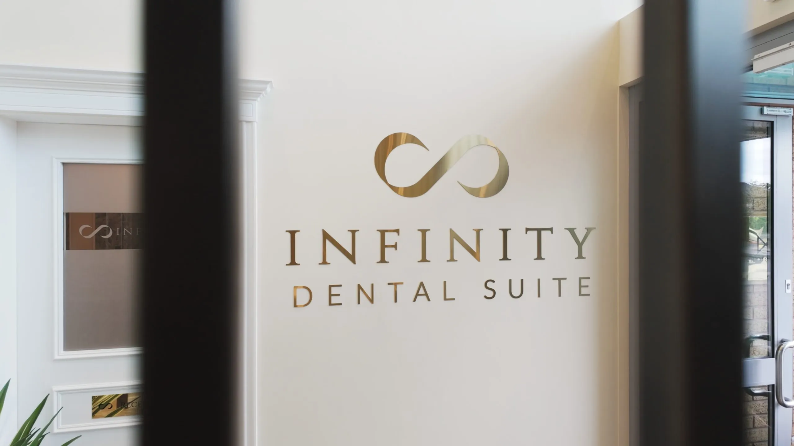 Gold Infinity Dental Suite signage from the Harrogate practice fit-out
