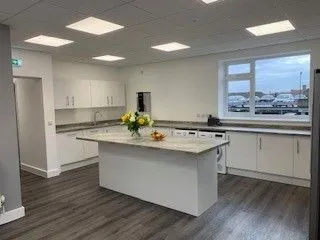 Staff room with central island and kitchen units at Queensway Dental, Billingham
