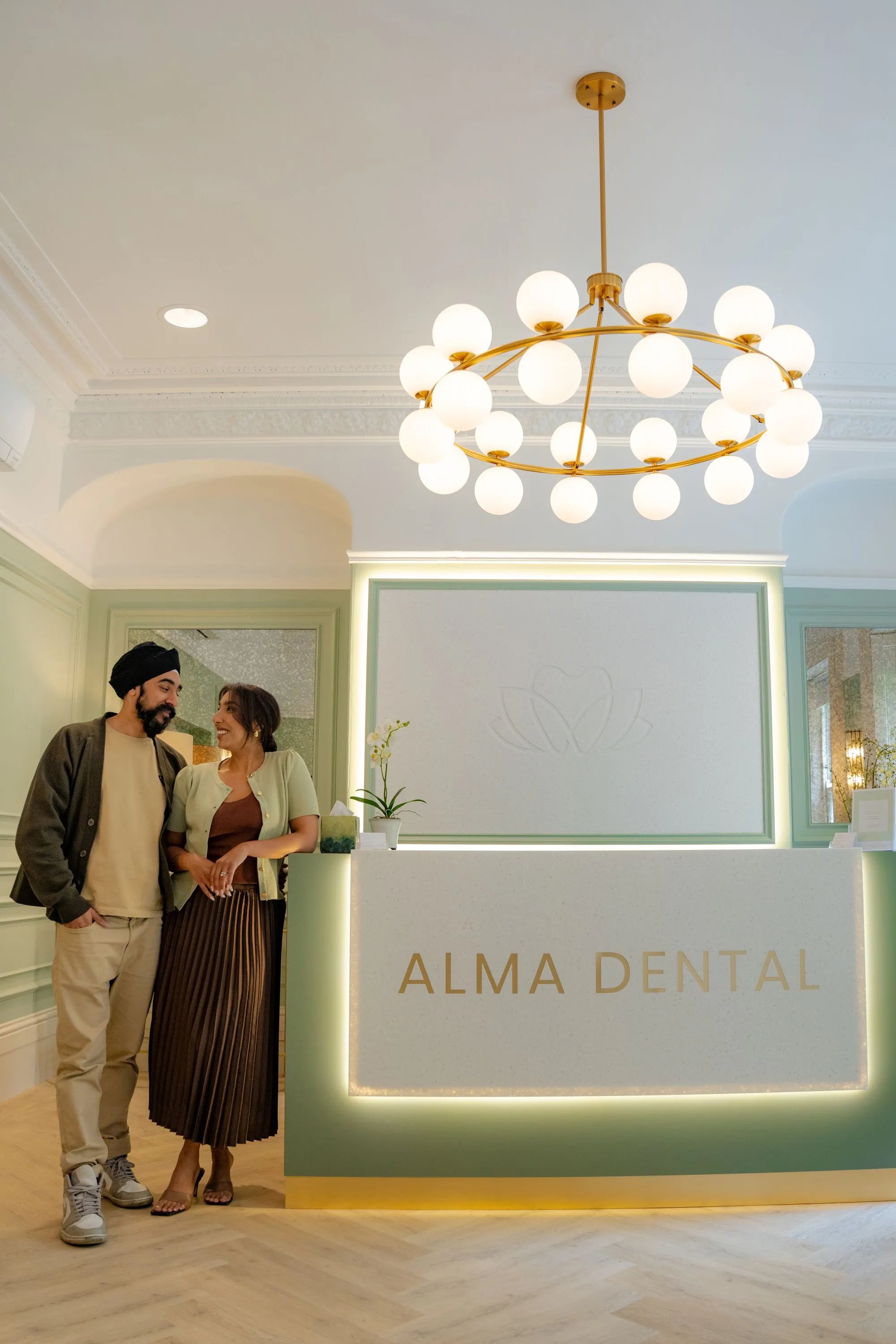 The principals of Alma Dental at their new reception desk, North Shields