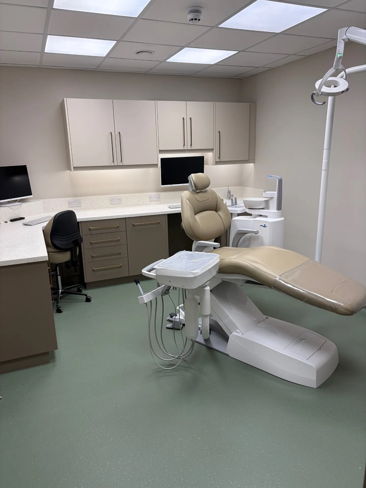 New dental surgery with cabinetry and treatment chair at Roots Dental, Morpeth