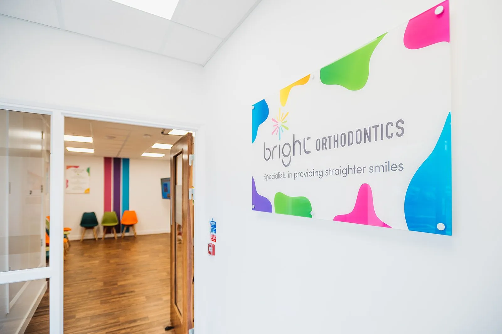 Bright Orthodontics branded feature wall in the Warrington practice